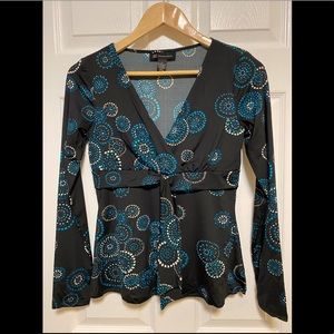 INC blue and white design top